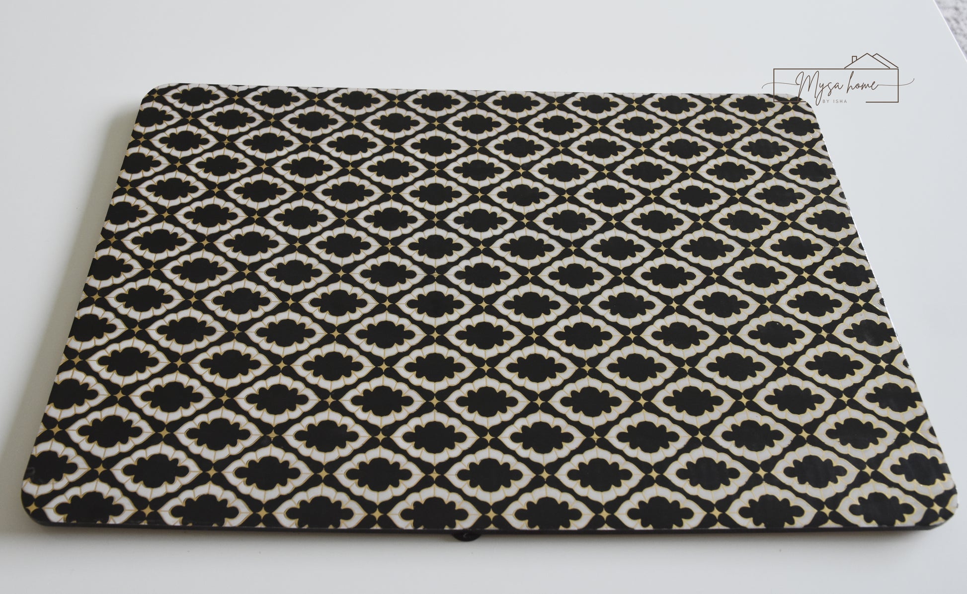 Noir black and white MDF waterproof wipe clean table mat on dining table