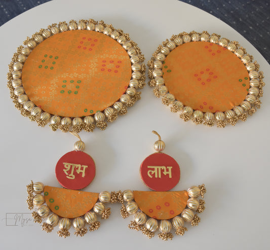 Rangoli: Reversible Mat with optional Shubh Labh hanging- Red Patola + Yellow Banarasi